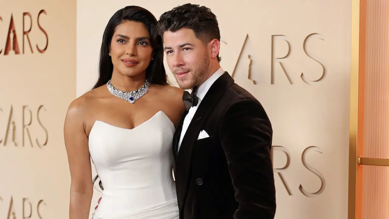 Priyanka Chopra turned heads in a stunning white gown as she walked the red carpet with husband Nick Jonas